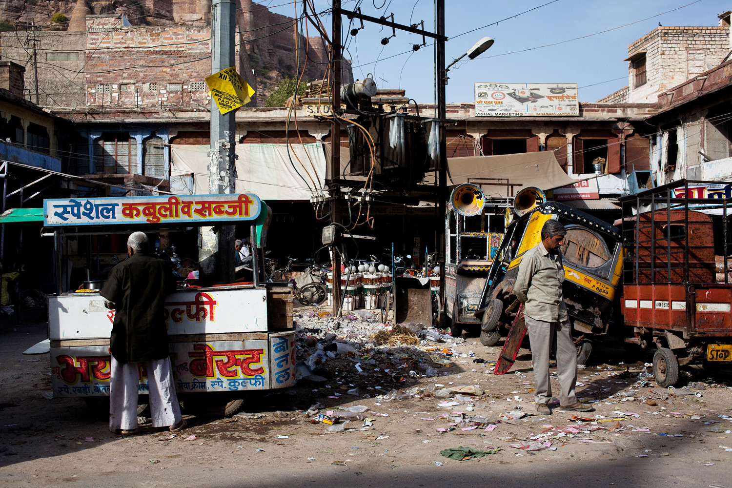 vendor and trash on a street in India