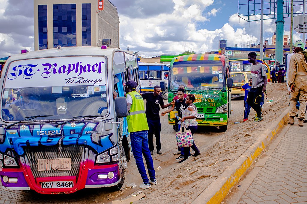 People entering buses in Kenya