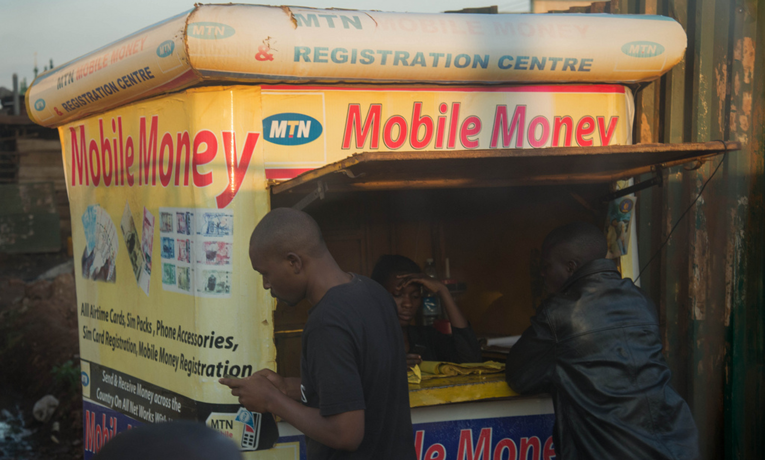 Takeup and Impact of Digital Repayment in Microfinance in Uganda CEGA