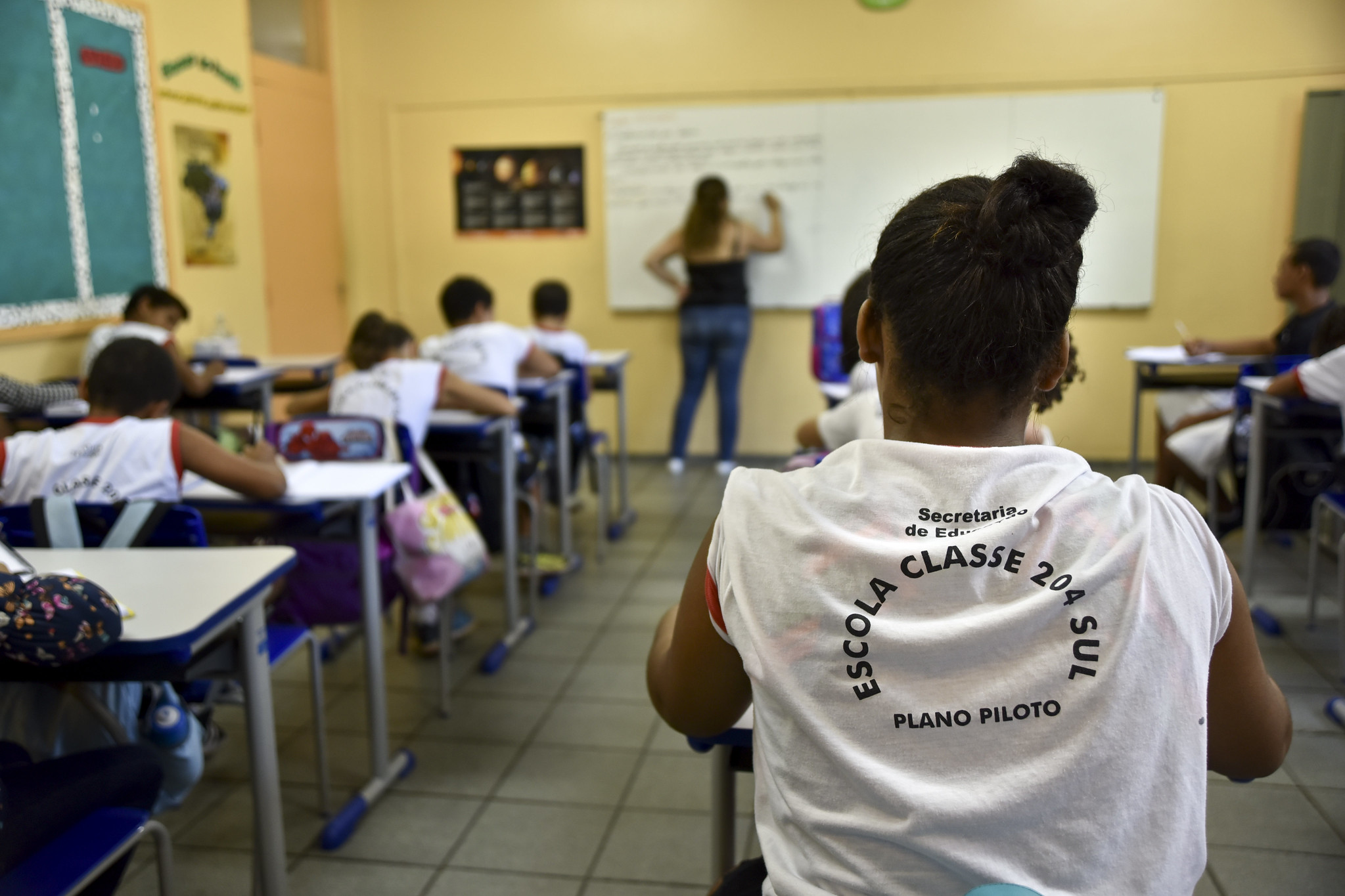 Brazilian youth learning in classroom