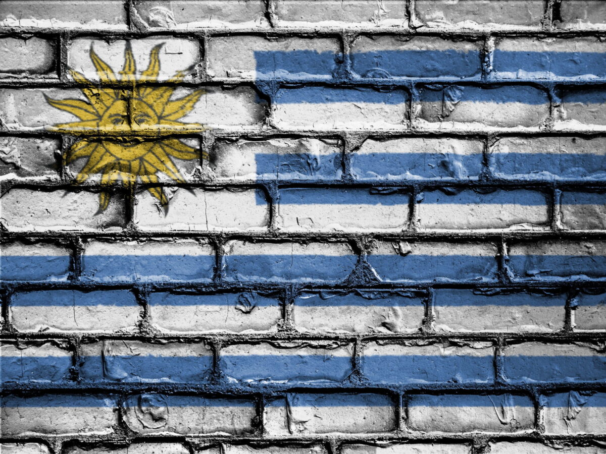Uruguayan flag painted on brick wall. Credit: PXFuel